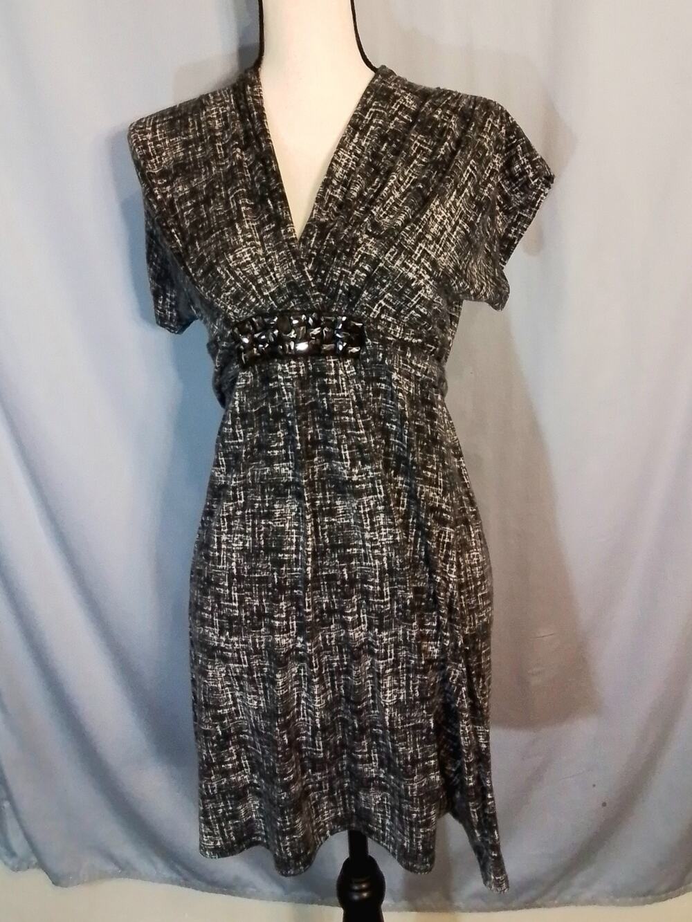As U Wish black dress with  reflective rivet buttons at waist